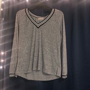 Gray sweater with black & white striped V-Neck